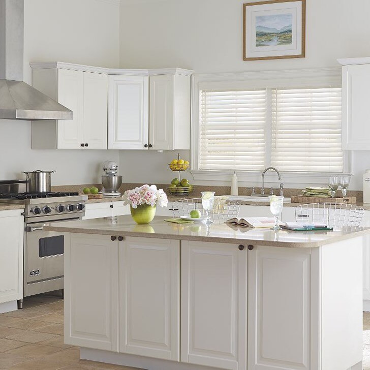 Faux Wood Blinds are a great choice for windows that might come in contact with moisture. Color: Smooth Pearl White 120