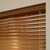Detailed close up of the riviera complete 1inch cordless blinds in the copperite color focused on the top rail and slats.